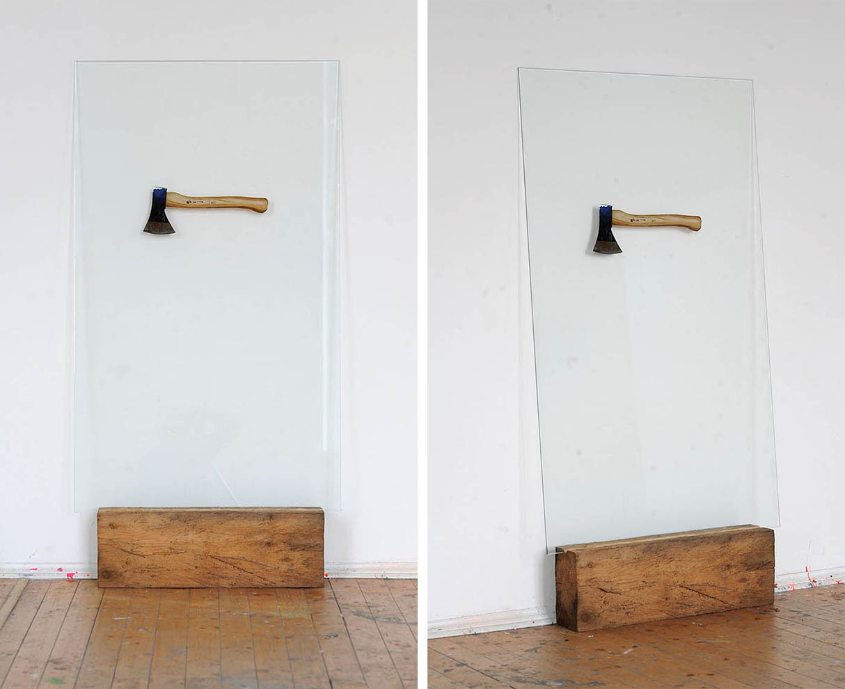painting of an ax behind glass on a wooden base by Michel Schneider